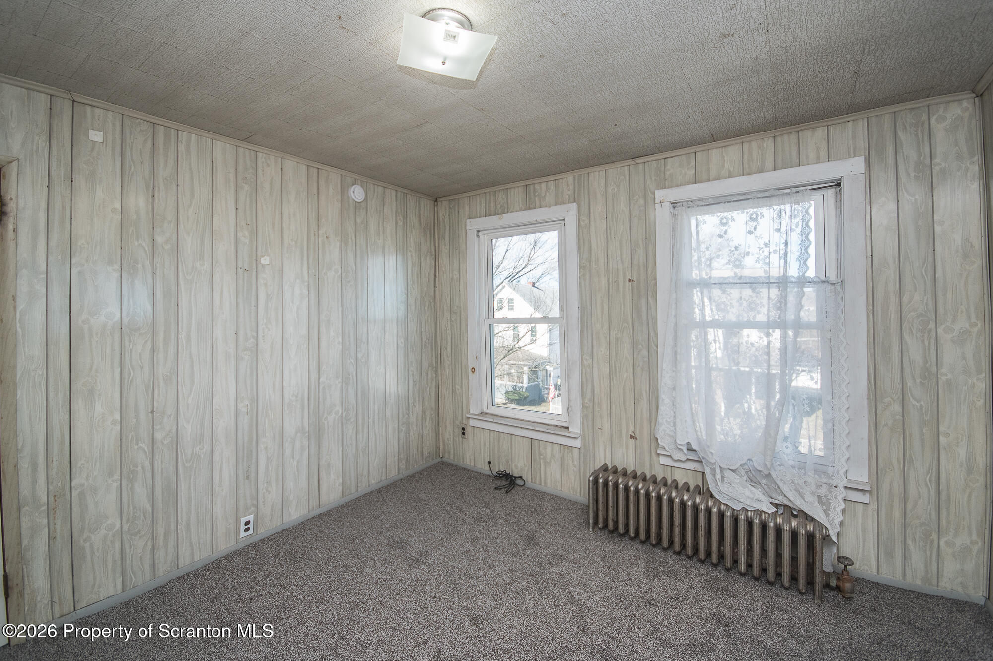 8 Stout Street Pittston, PA 18640 - Photo 21 of 25 a view of an empty room with window