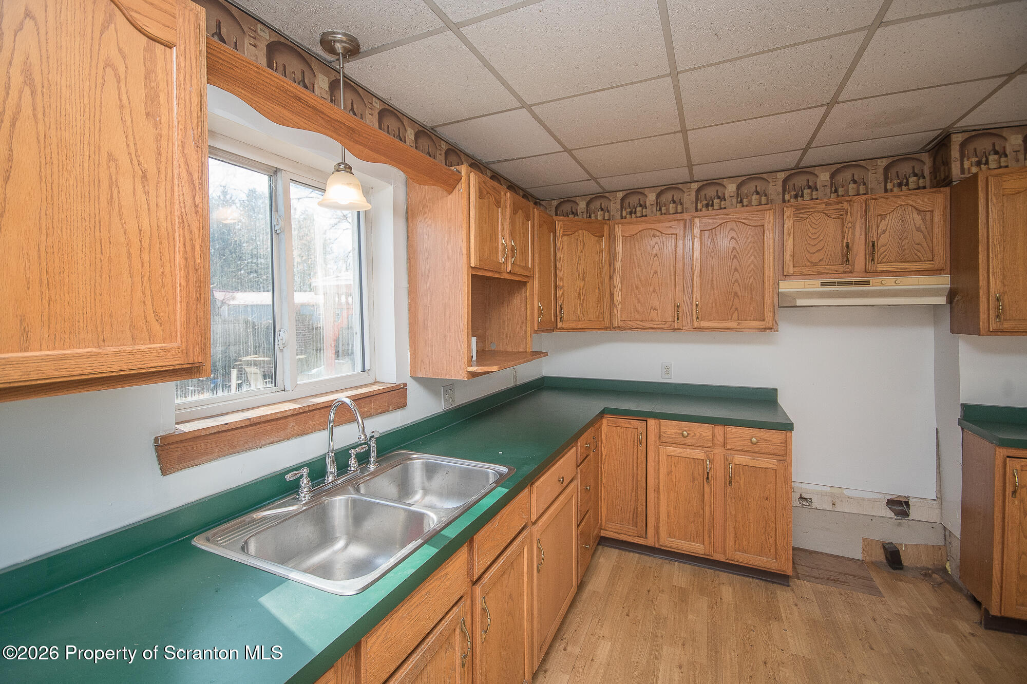 8 Stout Street Pittston, PA 18640 - Photo 6 of 25 a kitchen with a sink and a large window