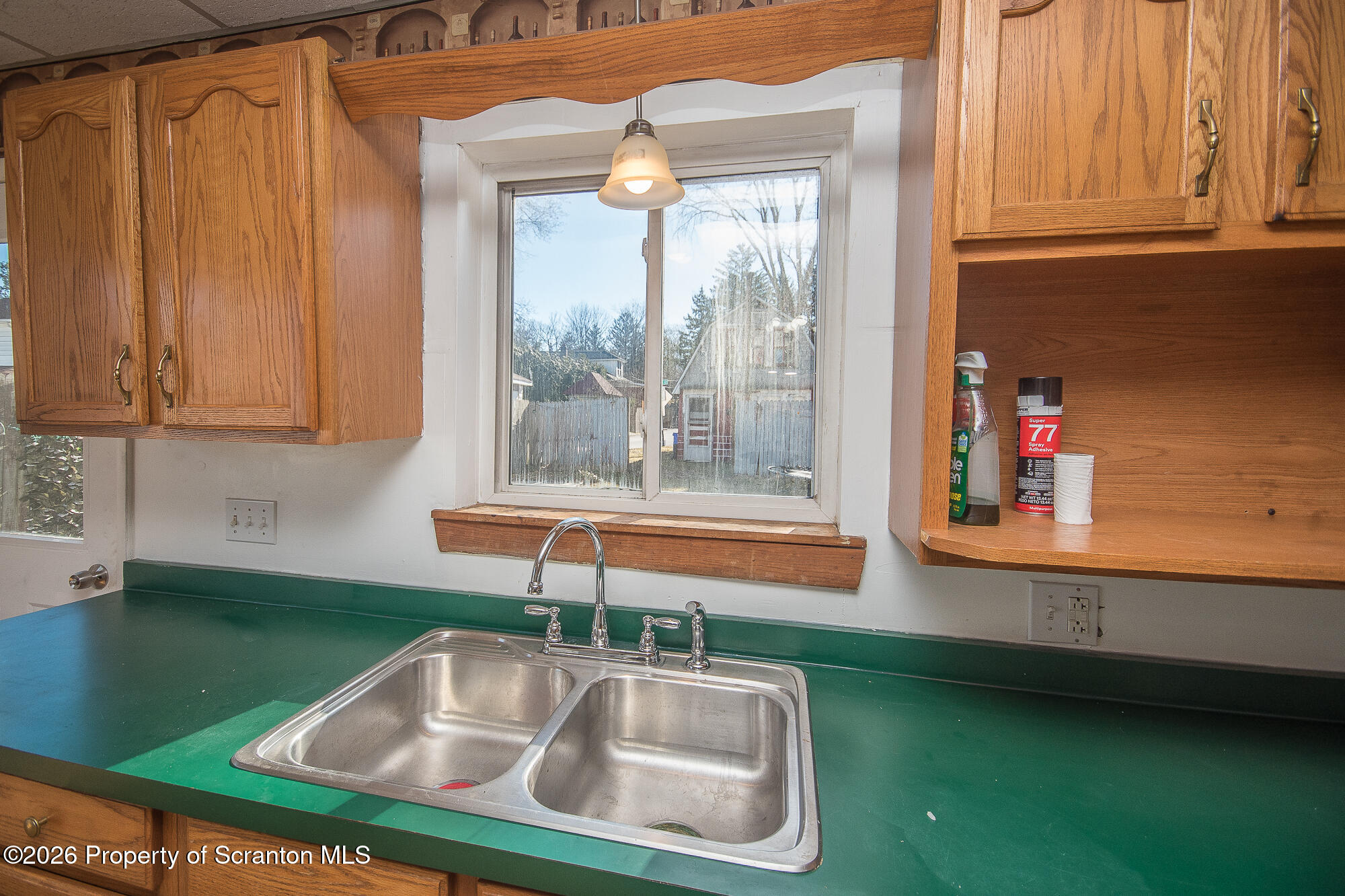 8 Stout Street Pittston, PA 18640 - Photo 7 of 25 a kitchen with a sink and a window
