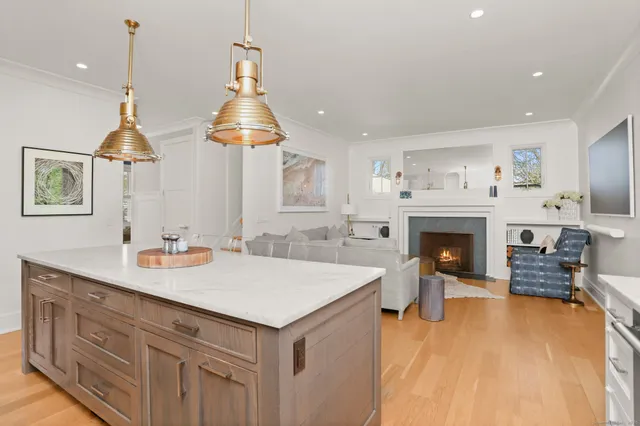 a room with furniture and a fireplace