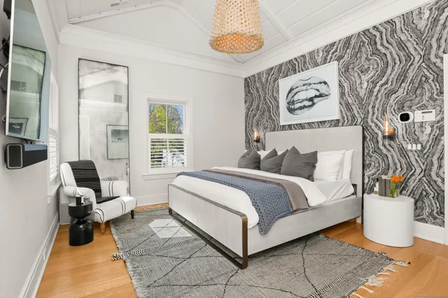 a bed room with a bed and a couch