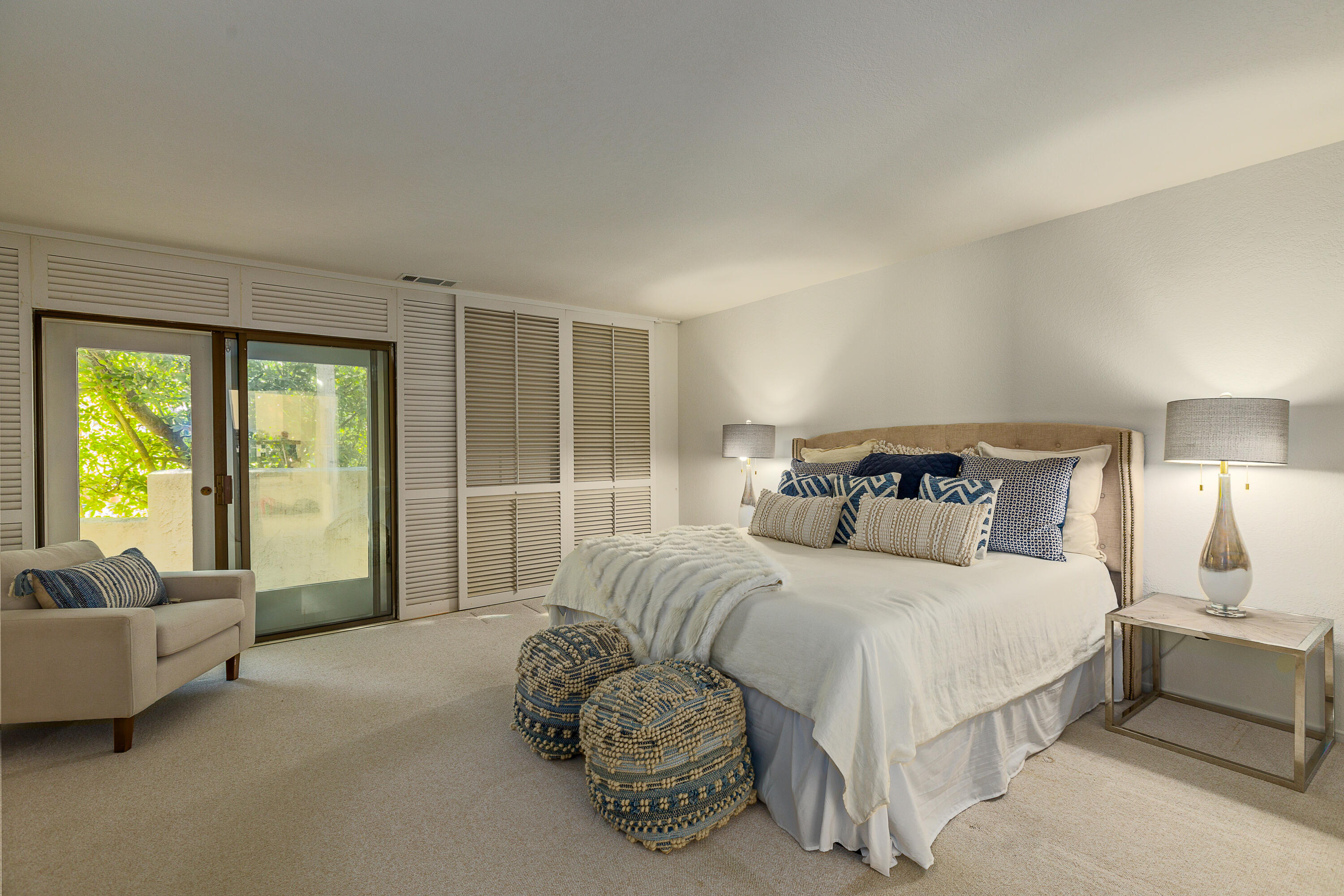 1532 Manitou Road Santa Barbara, CA 93105 - Photo 14 of 20 a bedroom with a bed and a couch next to a window