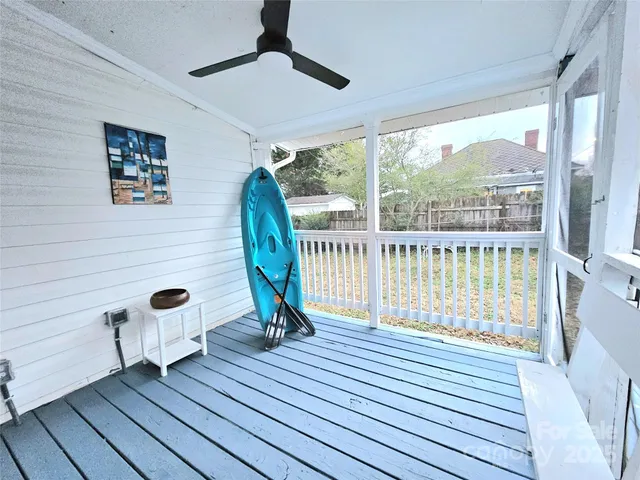 a view of a deck with wooden floor and outdoor space