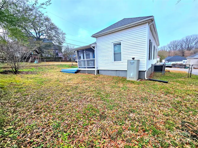a view of a house with a swimming pool