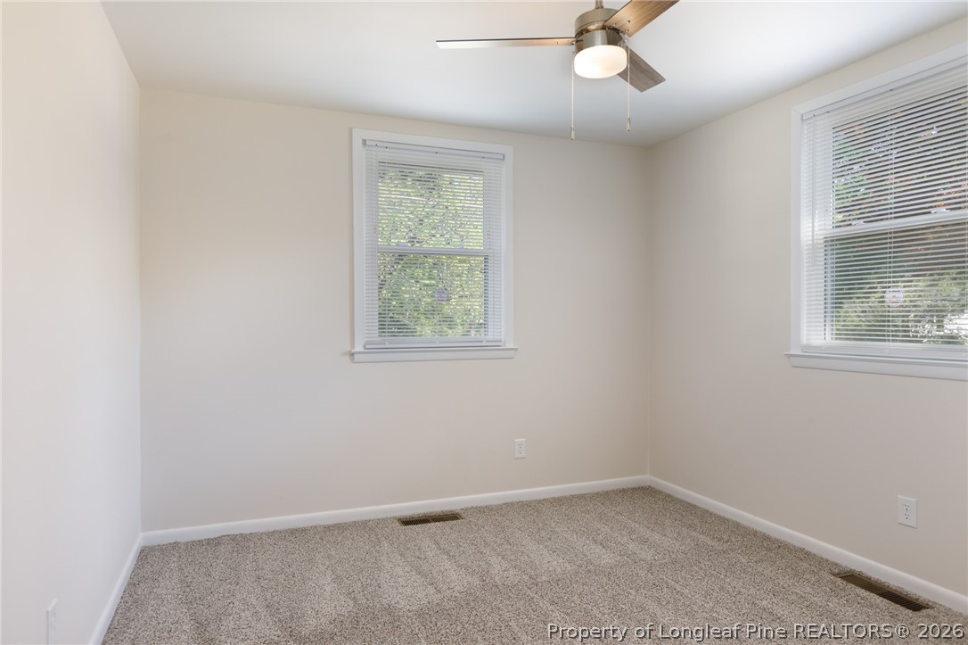 201 Scarborough Street Spring Lake, NC 28390 - Photo 12 of 26 an empty room with a window