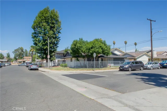 a view of a street with cars