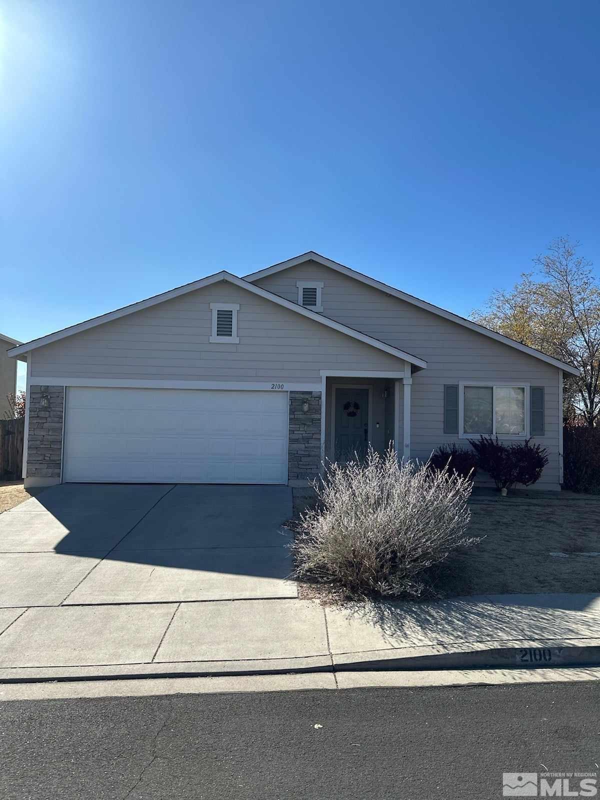 2100 Escalera Way Reno, NV 89523 - Photo 1 of 1 a front view of a house with a yard