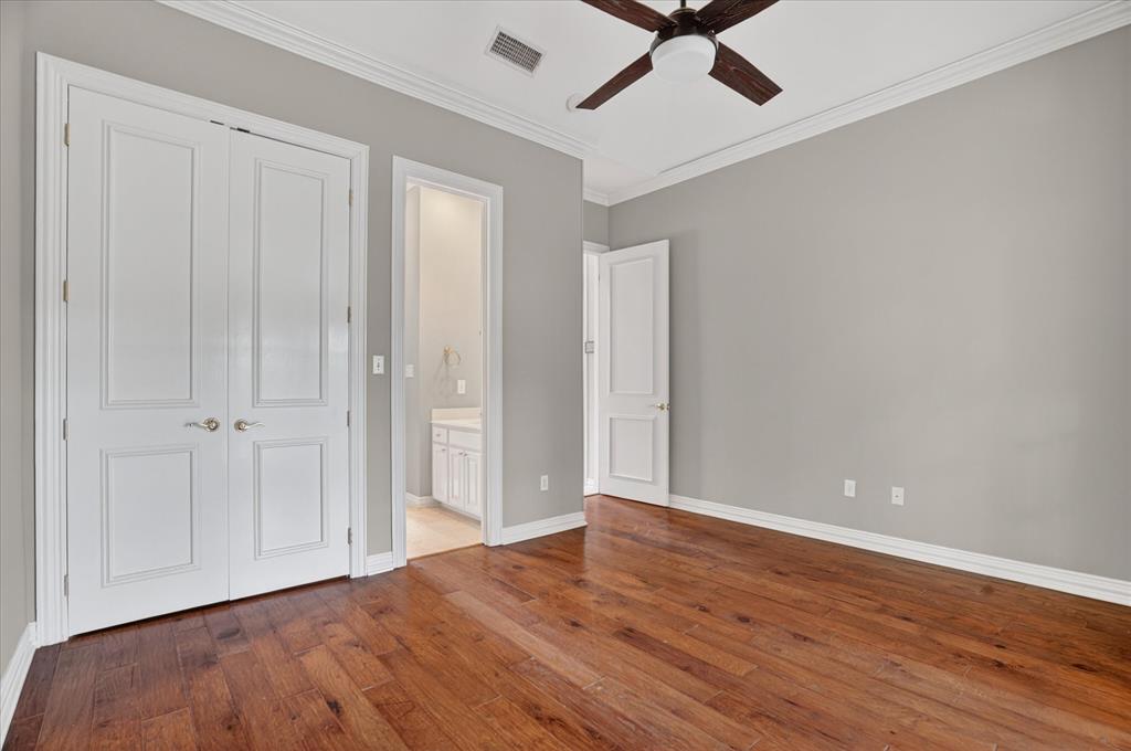 9704 Ravenswood Road Granbury, TX 76049 - Photo 21 of 40 a view of an empty room with wooden floor