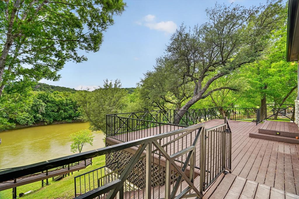 9704 Ravenswood Road Granbury, TX 76049 - Photo 28 of 40 a view of balcony with wooden floor and fence