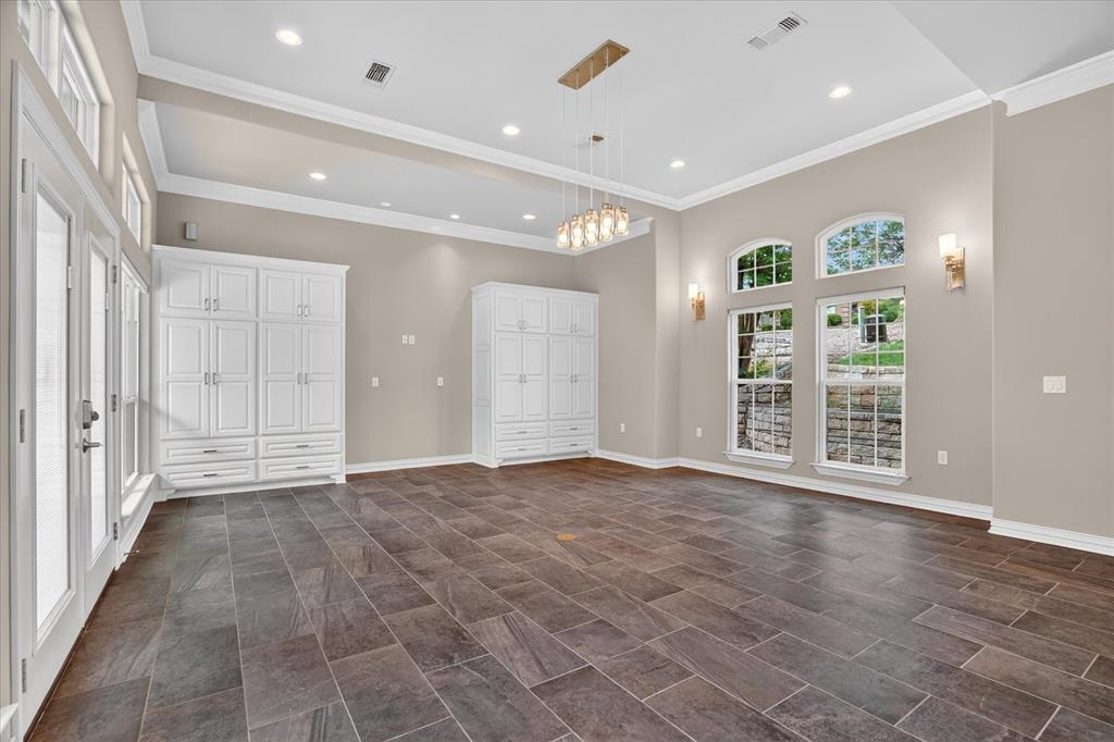 9704 Ravenswood Road Granbury, TX 76049 - Photo 29 of 40 a view of an empty room with a window