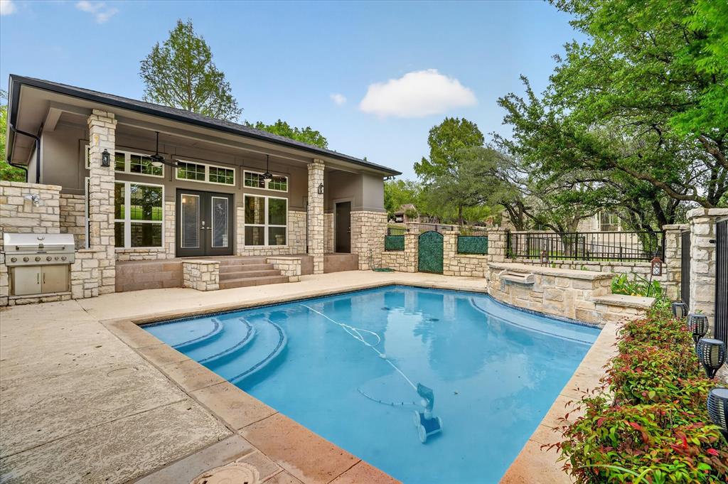 9704 Ravenswood Road Granbury, TX 76049 - Photo 5 of 40 a view of swimming pool with outdoor seating