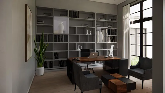 a view of a workspace with furniture and window