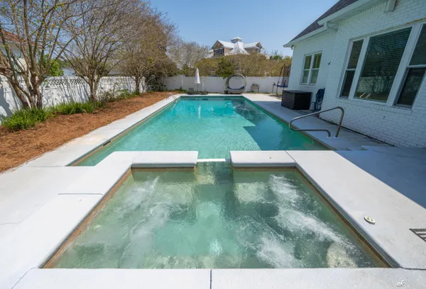 a view of a backyard with a small yard