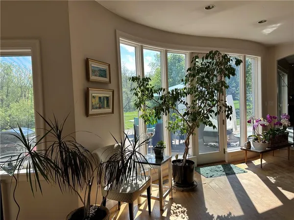 a view of a porch with a potted plant