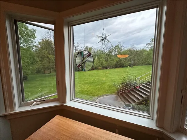a kitchen with a sink a stove and a microwave oven