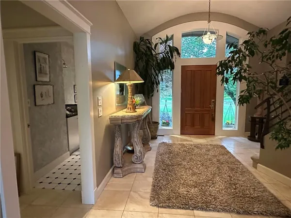 view of hall way with mirror