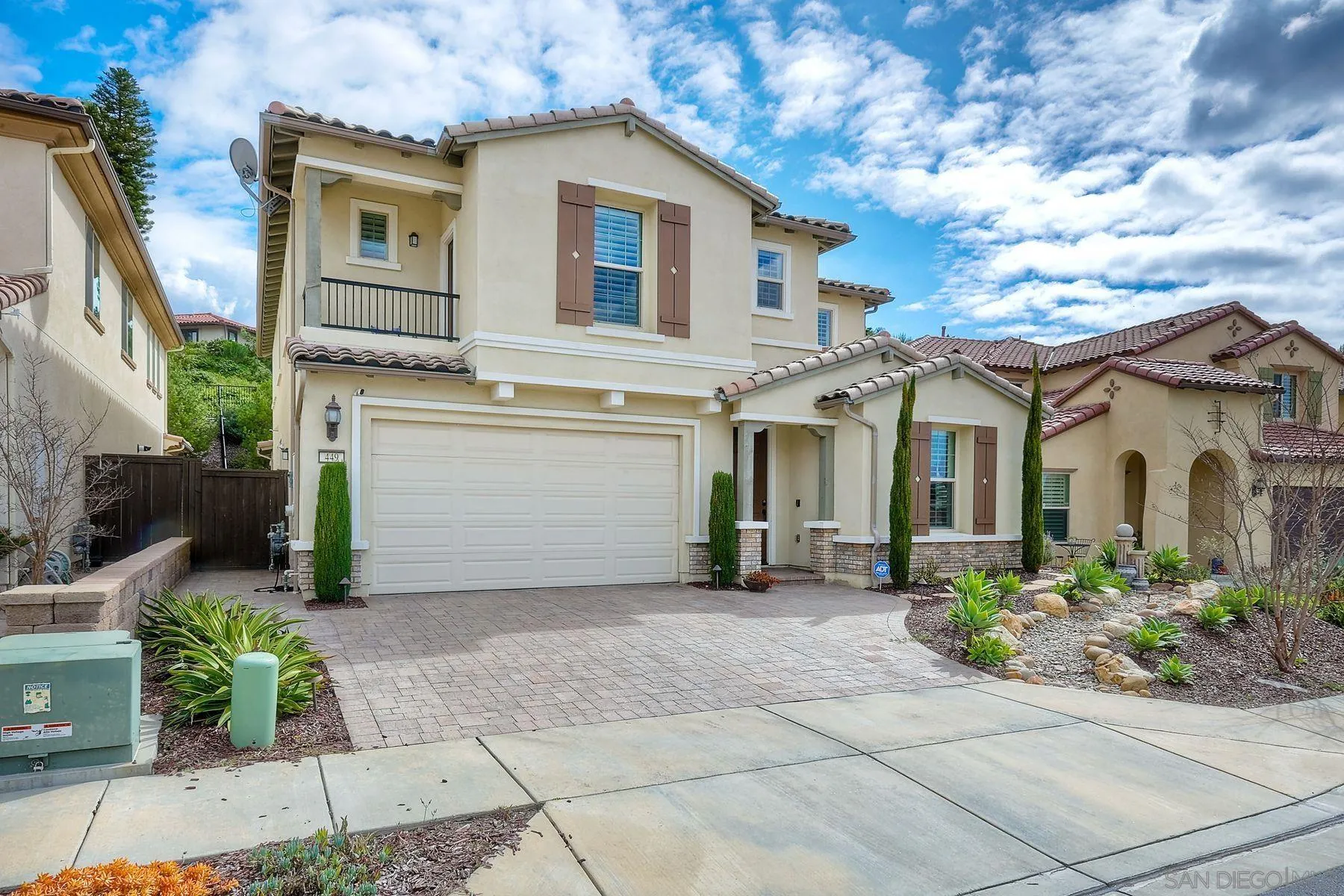 449 Cota Lane Vista, CA 92083 - Photo 1 of 2 a front view of a house with garden