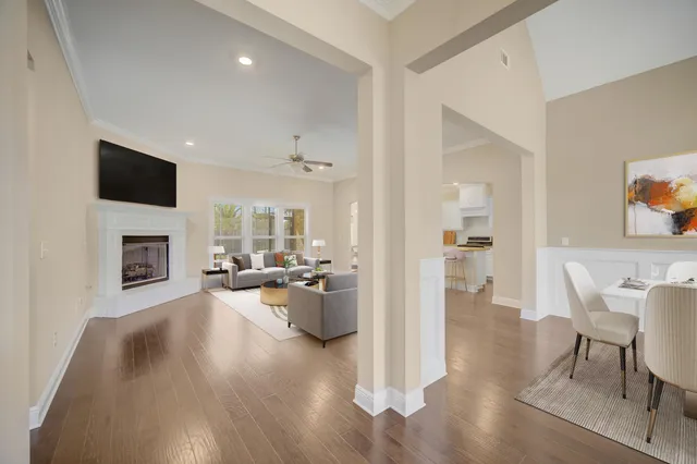 a large kitchen with kitchen island a sink stainless steel appliances and cabinets