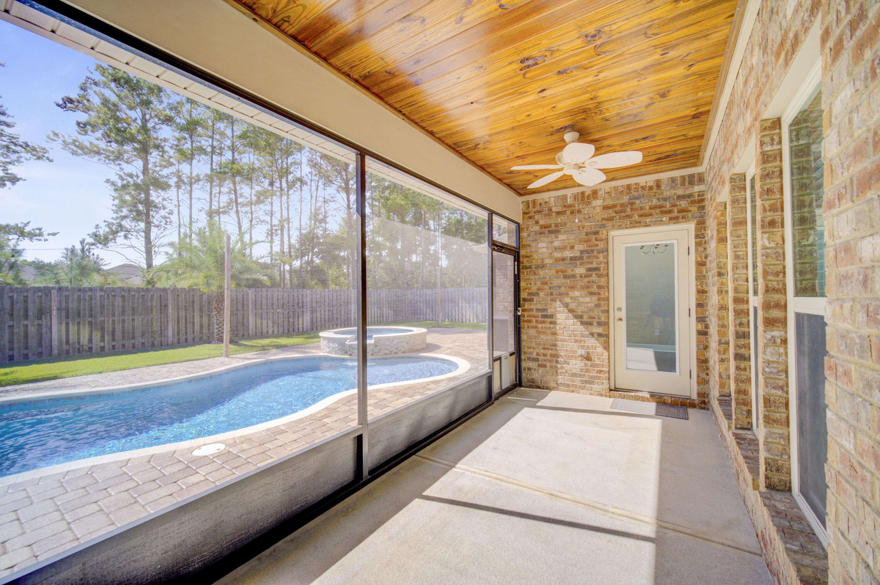 136 Buxtons Way Freeport, FL 32439 - Photo 20 of 59 Screened Patio