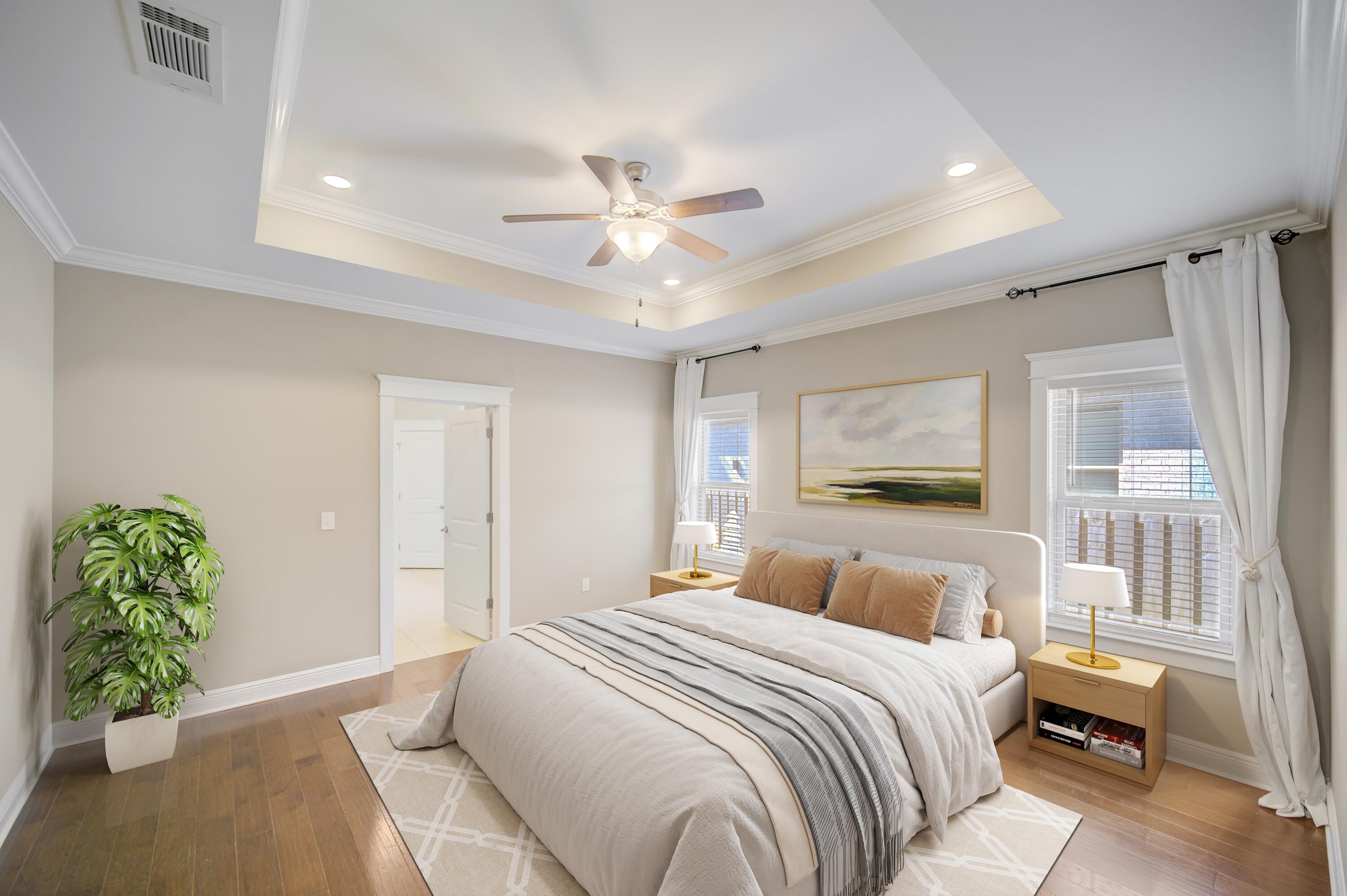 136 Buxtons Way Freeport, FL 32439 - Photo 21 of 59 a bedroom with a bed and a chandelier