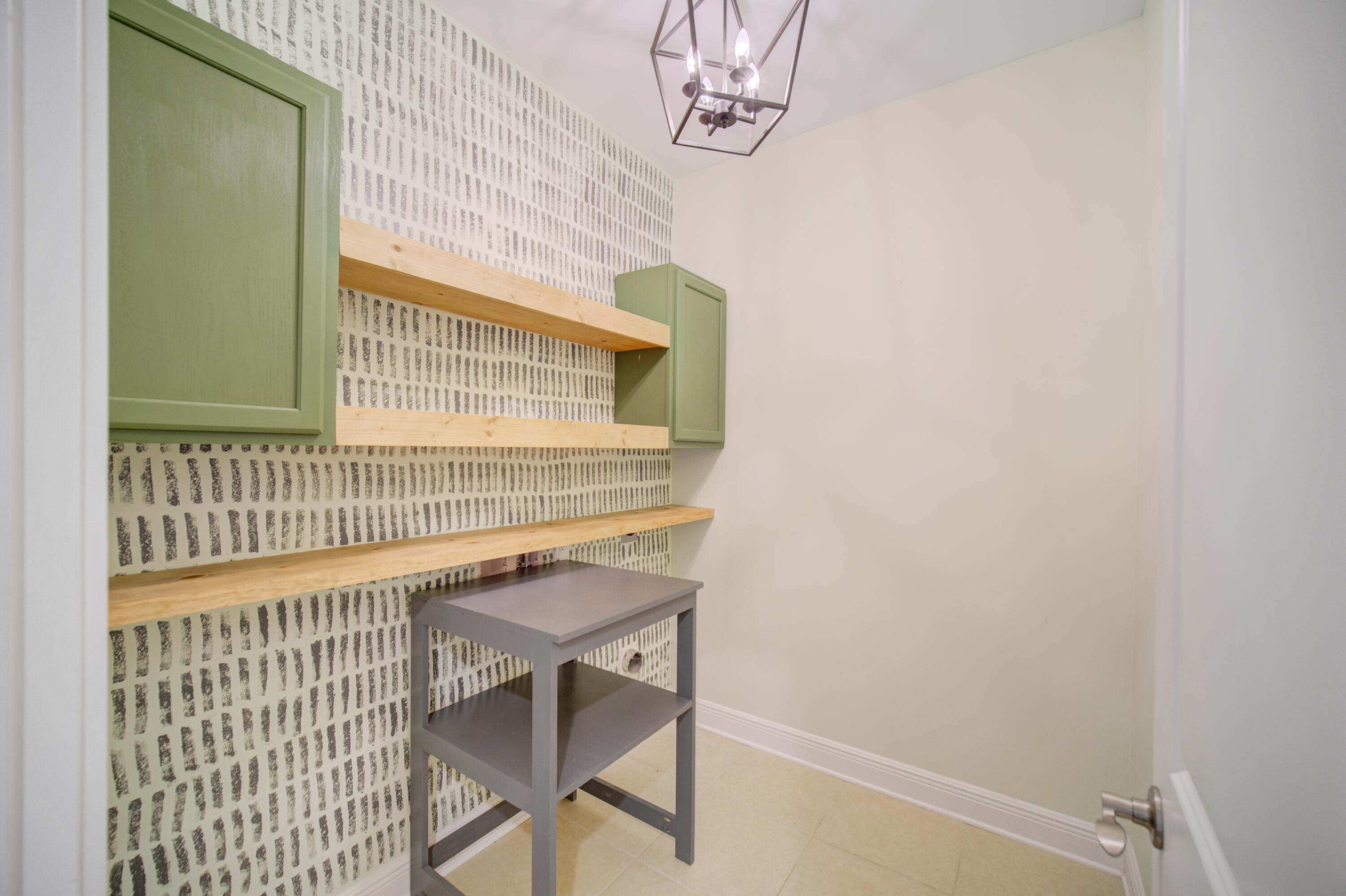 136 Buxtons Way Freeport, FL 32439 - Photo 32 of 59 a bathroom with a sink and a mirror
