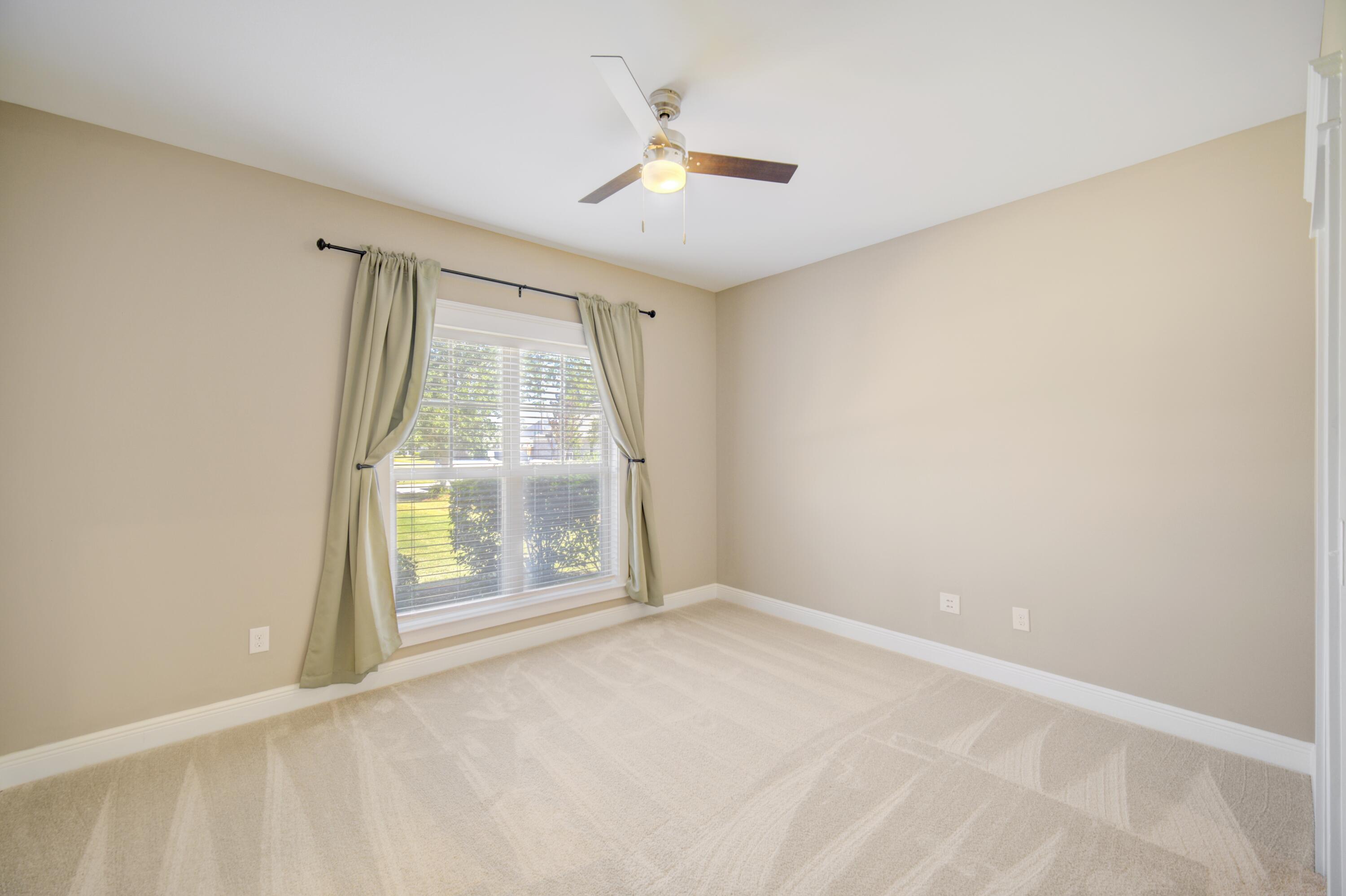 136 Buxtons Way Freeport, FL 32439 - Photo 37 of 59 an empty room with a window