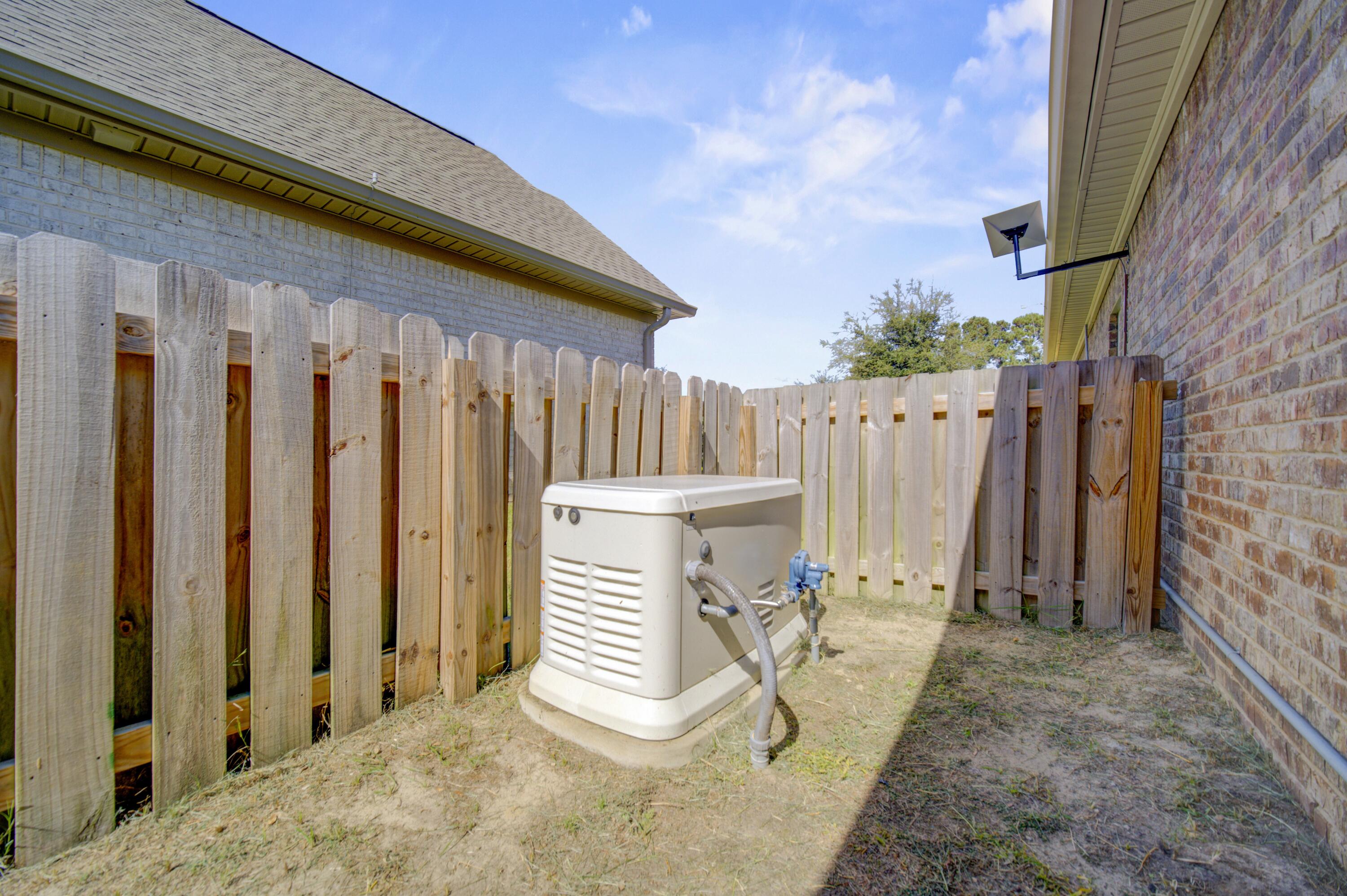 136 Buxtons Way Freeport, FL 32439 - Photo 48 of 59 a view of a backyard with patio