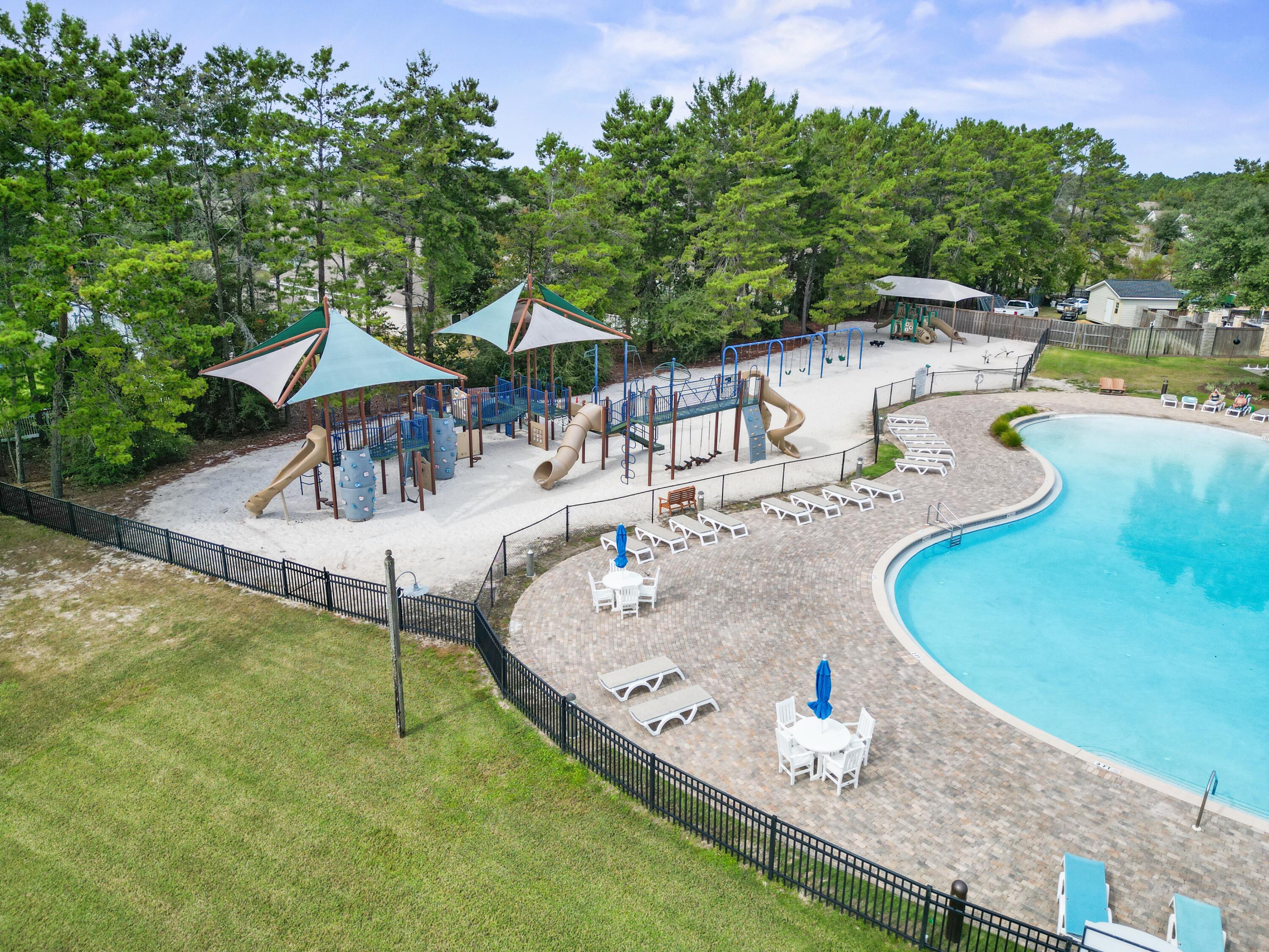 136 Buxtons Way Freeport, FL 32439 - Photo 54 of 59 swimming pool view with a seating space