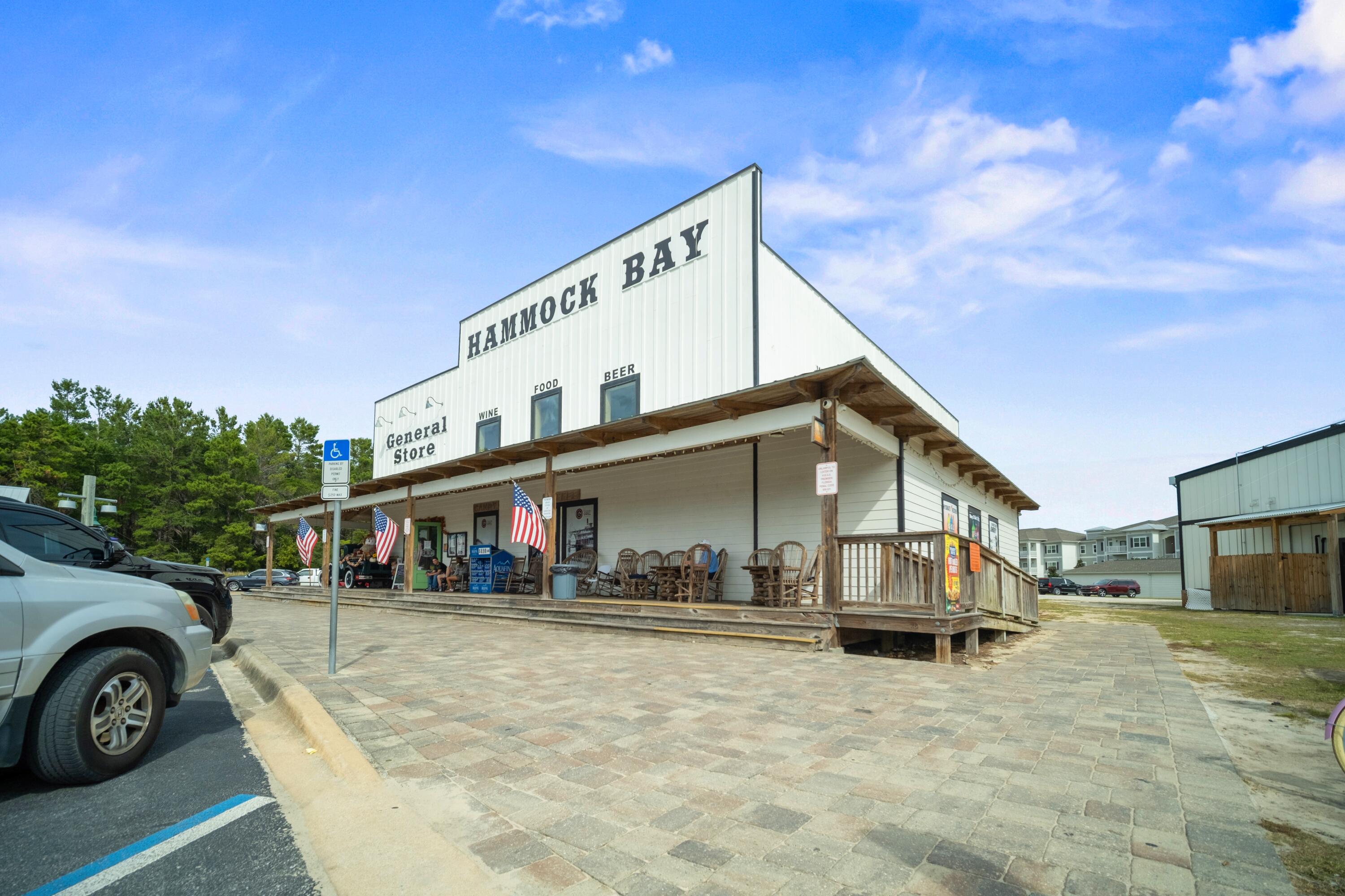 136 Buxtons Way Freeport, FL 32439 - Photo 56 of 59 a view of a house with cars on top of it