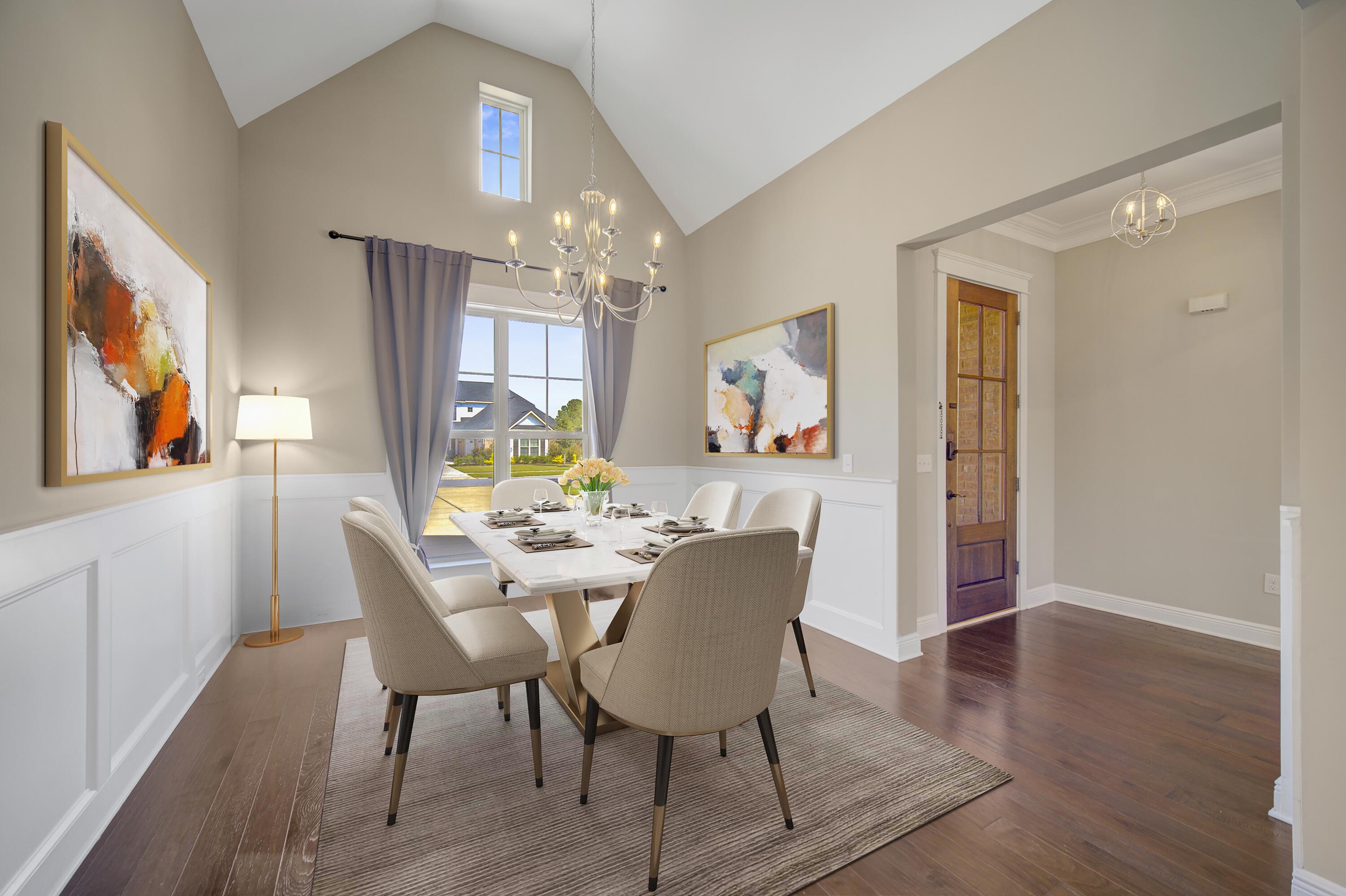136 Buxtons Way Freeport, FL 32439 - Photo 7 of 59 a view of a dining room with furniture and wooden floor