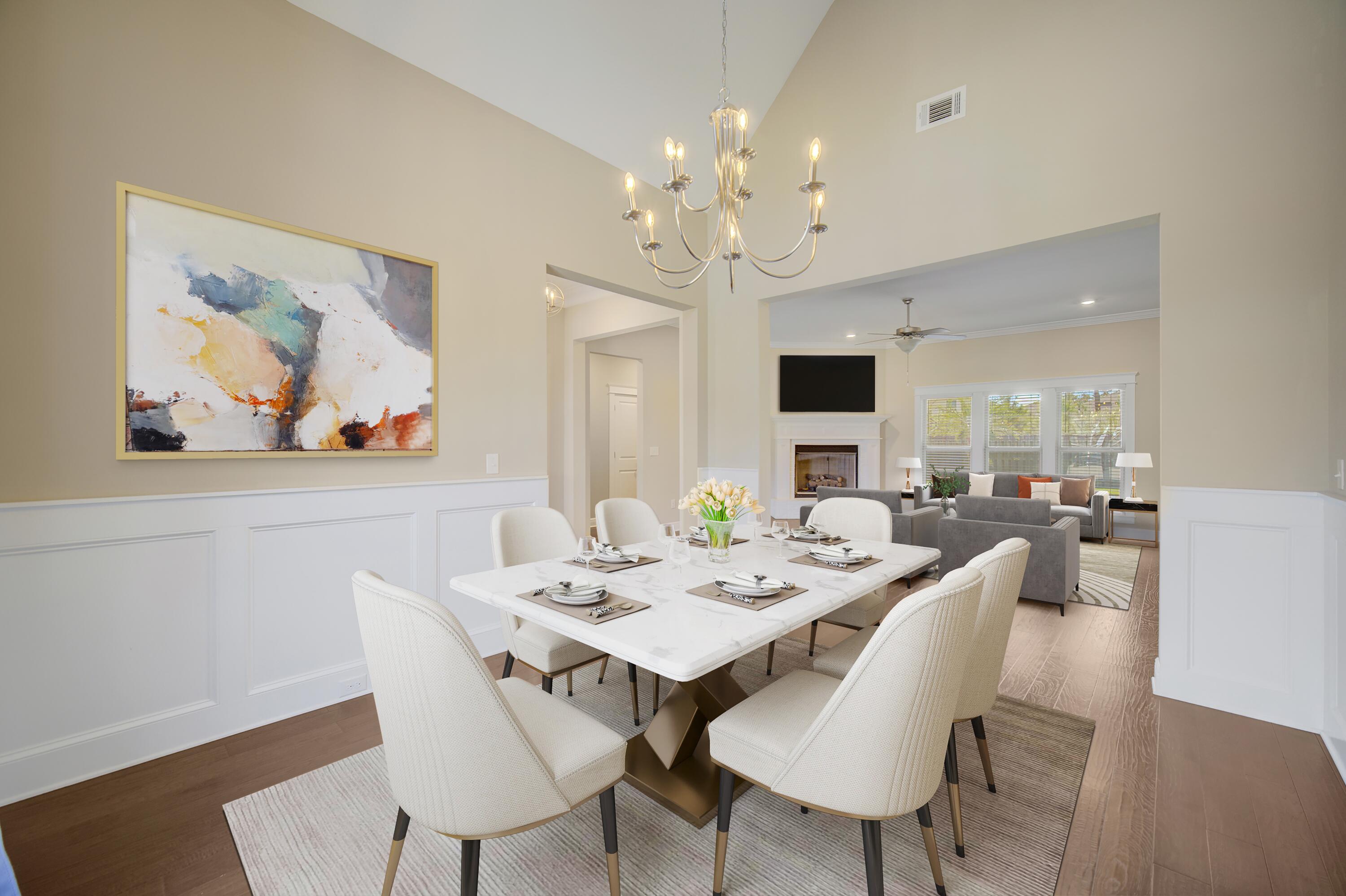 136 Buxtons Way Freeport, FL 32439 - Photo 8 of 59 a view of a dining room with furniture a rug and wooden floor