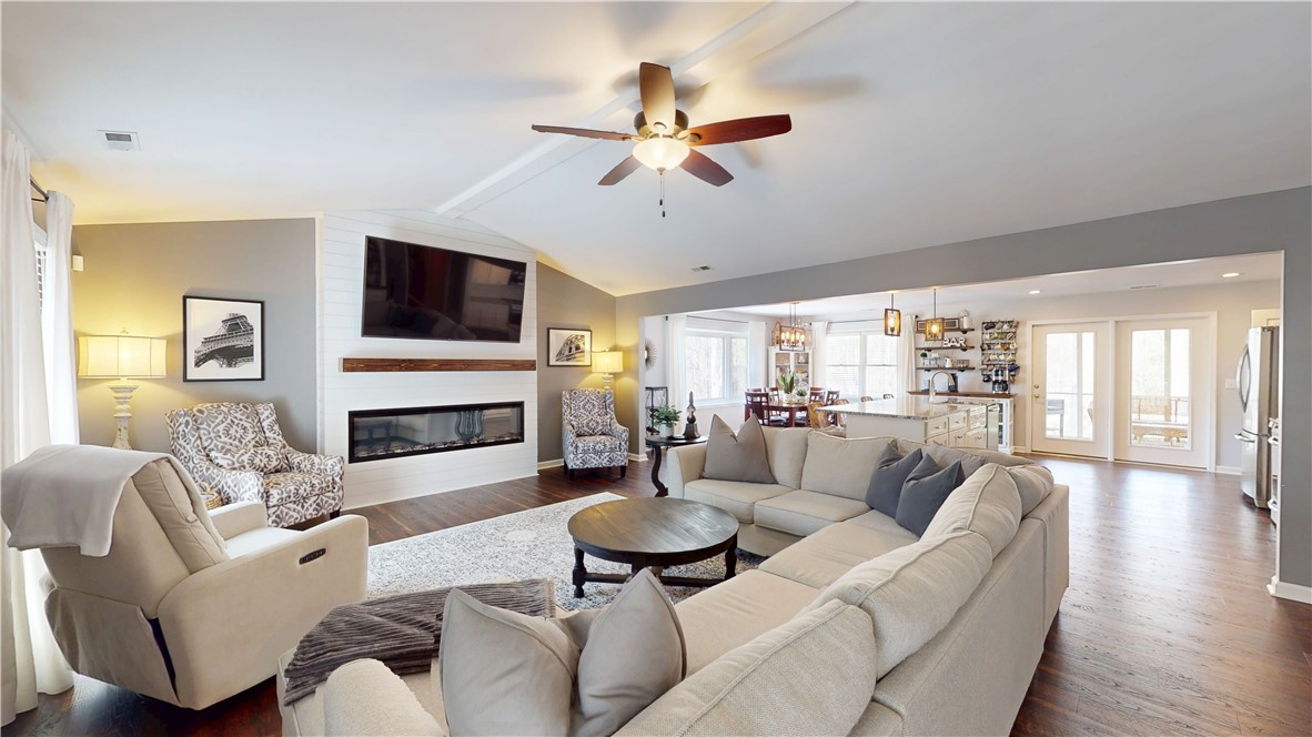 15009 Beacon Ridge Drive Seneca, SC 29678 - Photo 5 of 37 Living room with high ceilings and modern tones