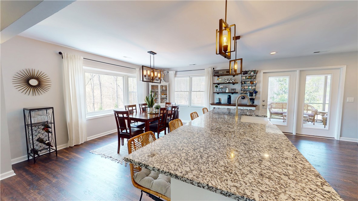 15009 Beacon Ridge Drive Seneca, SC 29678 - Photo 7 of 37 Center island with designer lighting