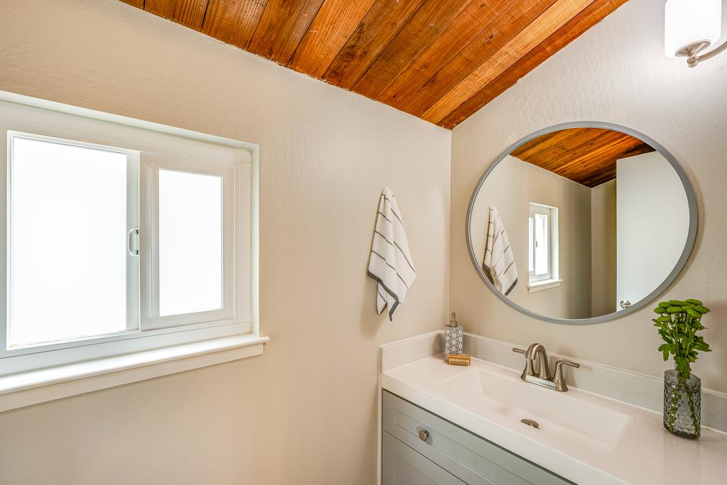 1695 Seascape Boulevard Aptos, CA 95003 - Photo 18 of 87 a bathroom with a sink and a mirror