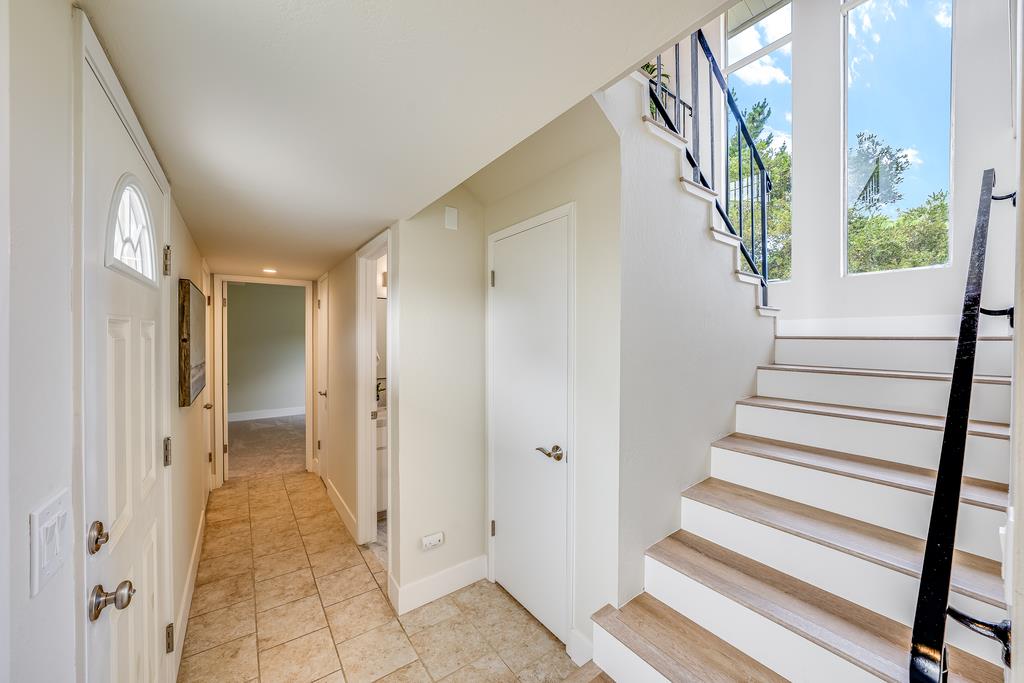 1695 Seascape Boulevard Aptos, CA 95003 - Photo 19 of 87 a view of a hallway with wooden floor and entryway