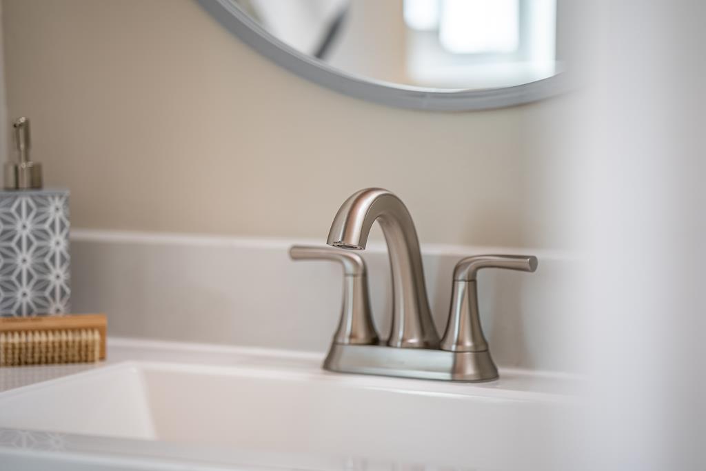 1695 Seascape Boulevard Aptos, CA 95003 - Photo 23 of 87 a close view of a faucet a sink and a window