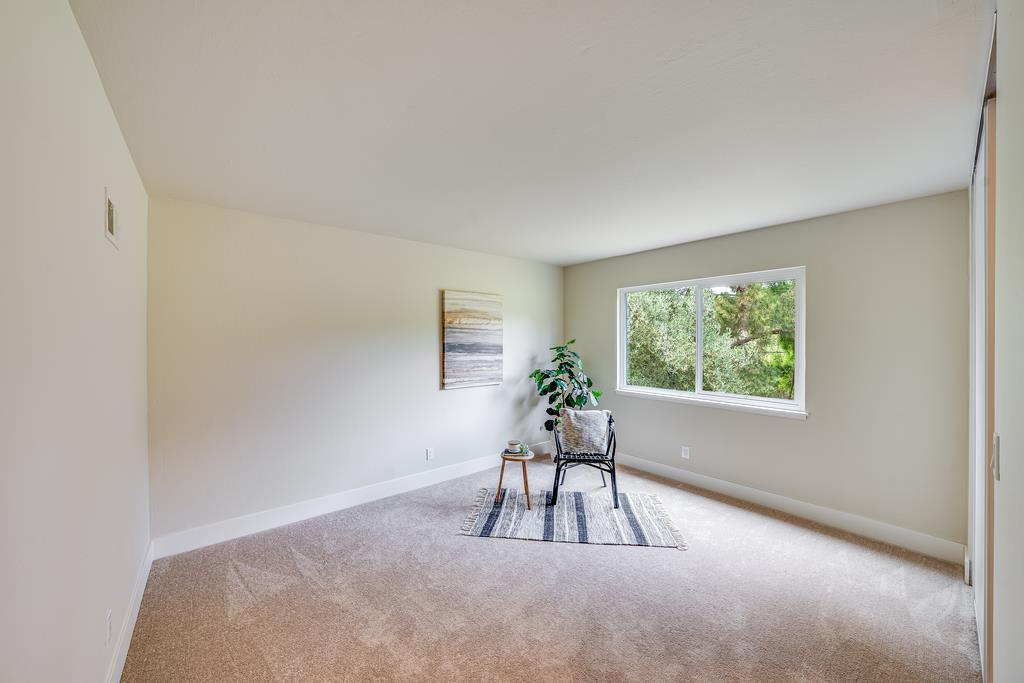 1695 Seascape Boulevard Aptos, CA 95003 - Photo 25 of 87 a living room with furniture and a potted plant