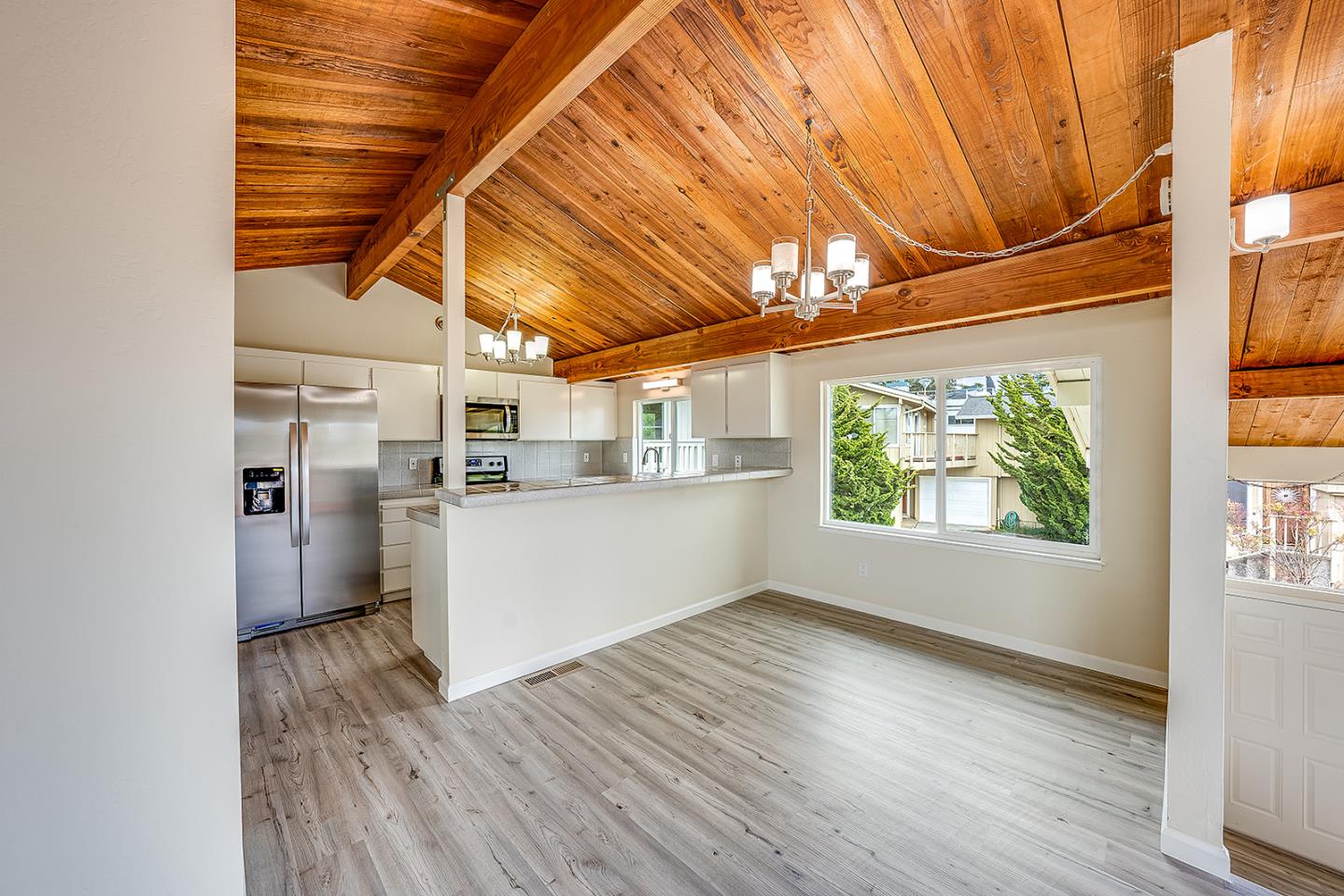 1695 Seascape Boulevard Aptos, CA 95003 - Photo 34 of 87 a view of a kitchen with wooden floor and cabinets