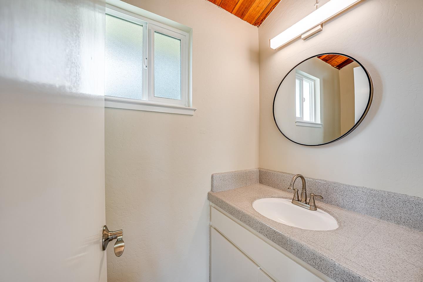 1695 Seascape Boulevard Aptos, CA 95003 - Photo 40 of 87 a bathroom with a sink and a mirror