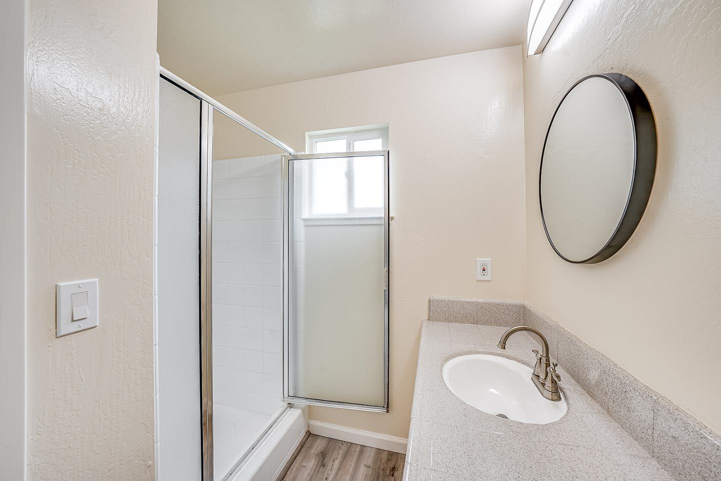 1695 Seascape Boulevard Aptos, CA 95003 - Photo 43 of 87 a bathroom with a granite countertop sink and a mirror