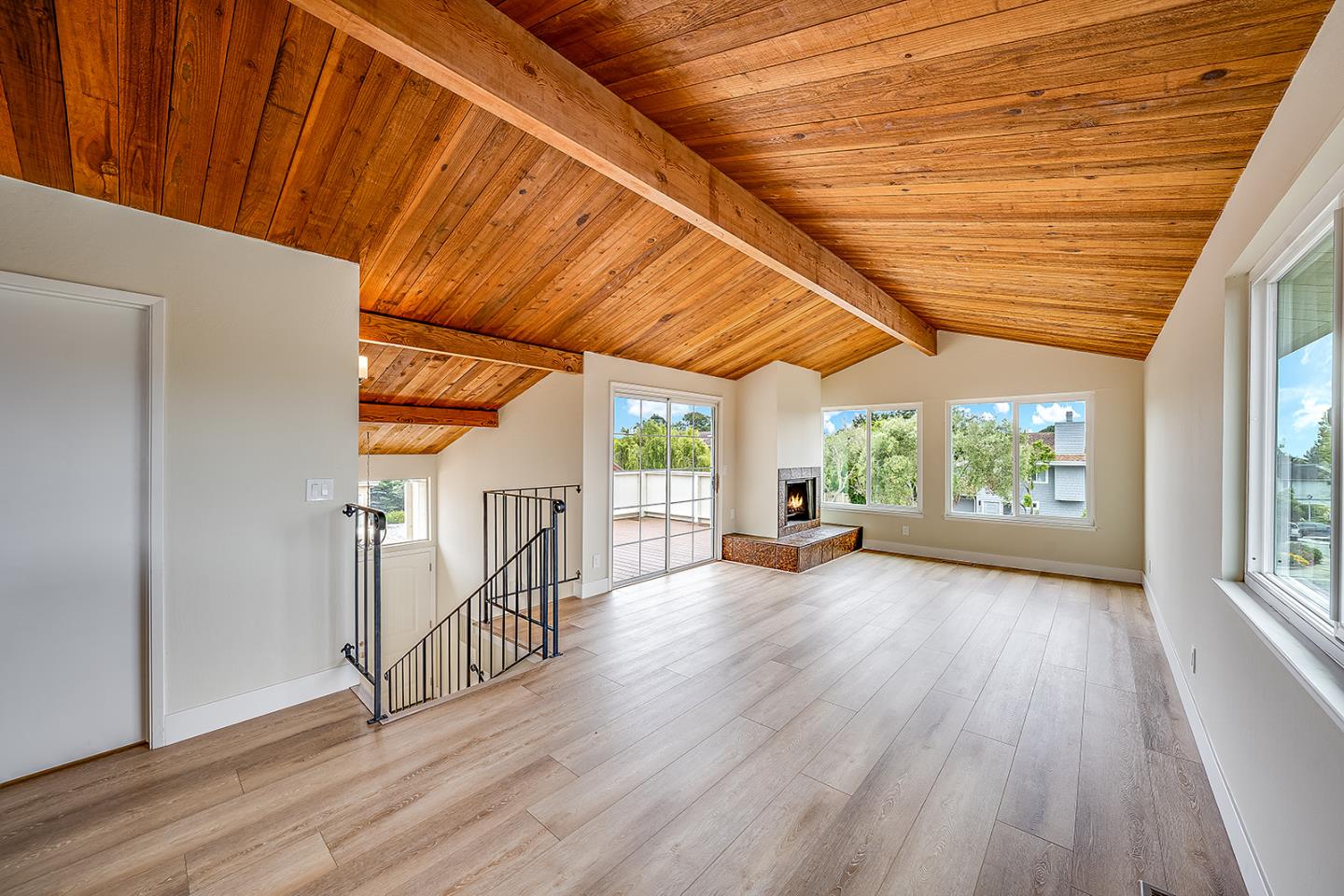 1695 Seascape Boulevard Aptos, CA 95003 - Photo 54 of 87 an empty room with wooden floor and windows