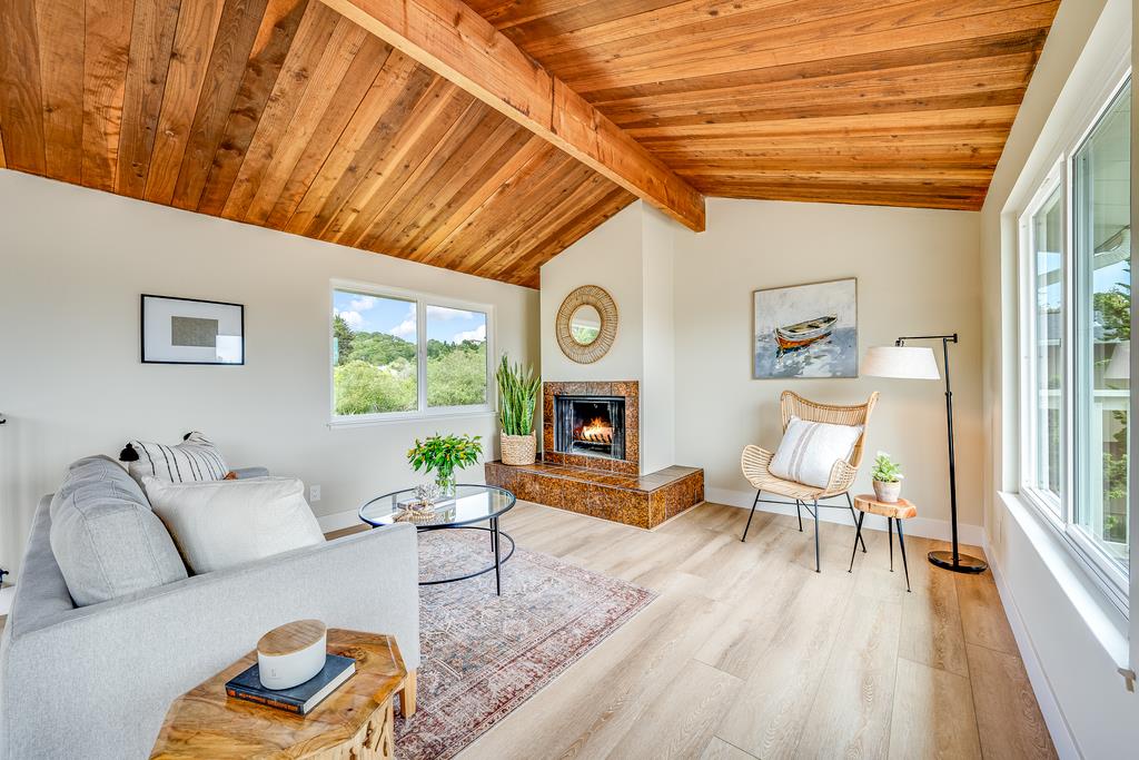 1695 Seascape Boulevard Aptos, CA 95003 - Photo 7 of 87 a living room with furniture and a fireplace