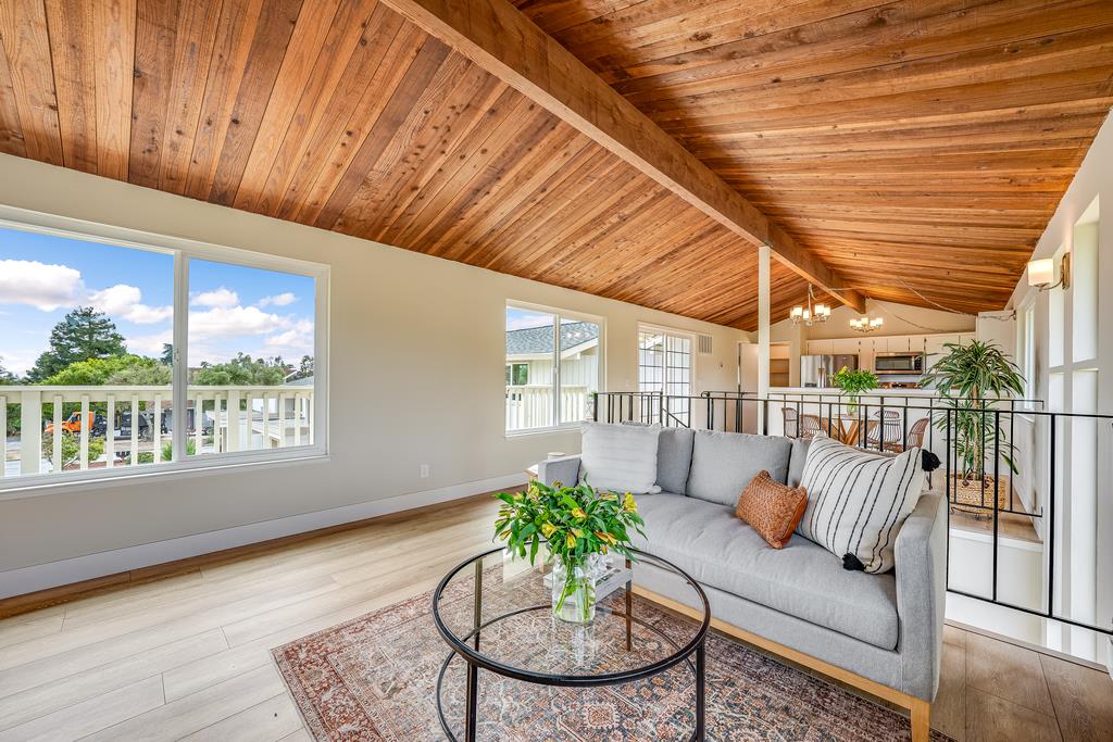 1695 Seascape Boulevard Aptos, CA 95003 - Photo 9 of 87 a living room with furniture and a potted plant