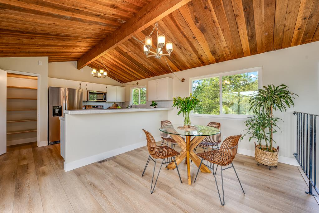 1695 Seascape Boulevard Aptos, CA 95003 - Photo 10 of 87 a dining room with furniture and wooden floor
