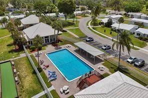 an aerial view of a house with outdoor space