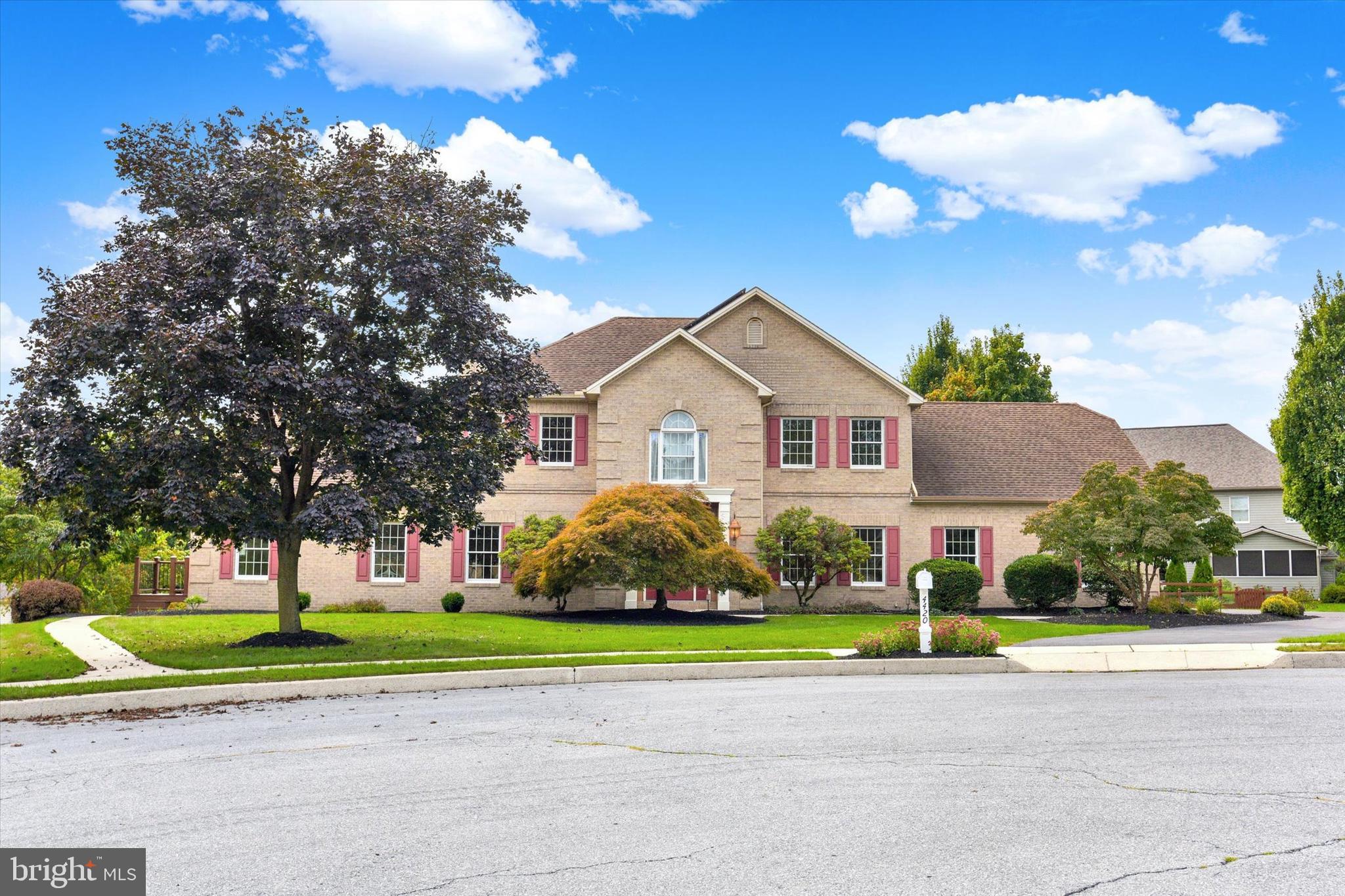4420 Rathlin Court Harrisburg, PA 17112 - Photo 1 of 41 a front view of a house with a yard and garage
