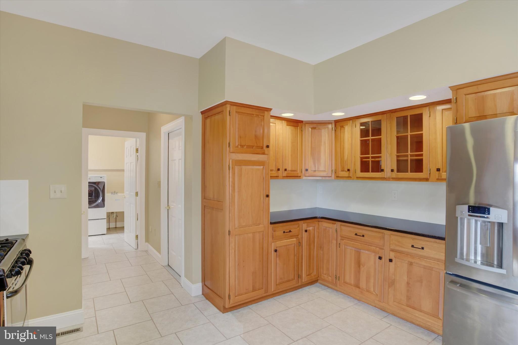 4420 Rathlin Court Harrisburg, PA 17112 - Photo 11 of 41 a kitchen with cabinets and refrigerator