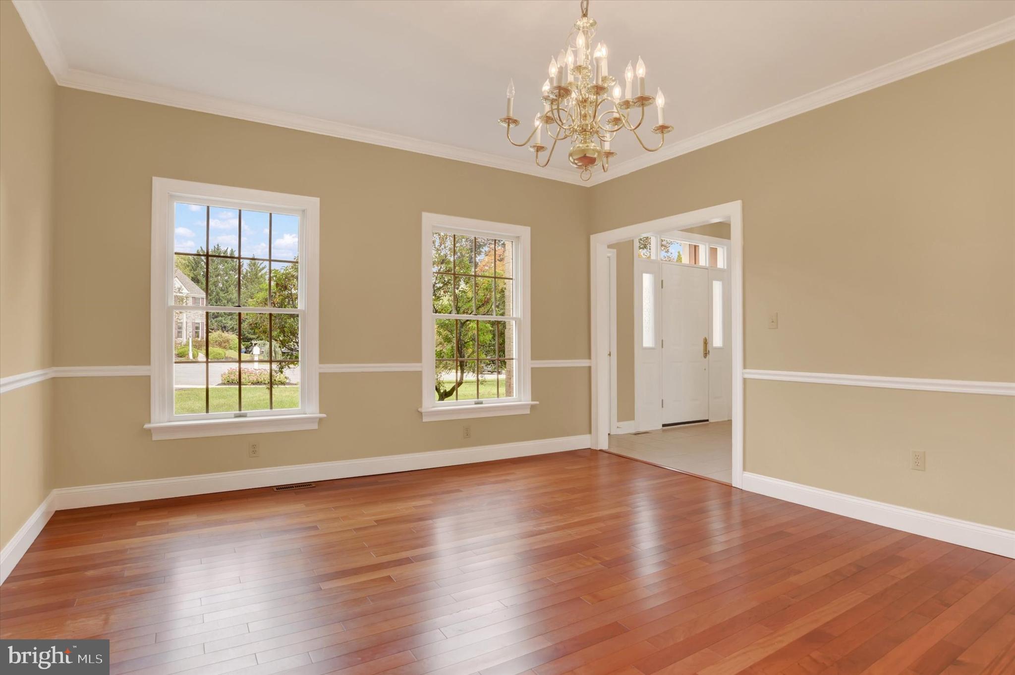 4420 Rathlin Court Harrisburg, PA 17112 - Photo 13 of 41 a view of an empty room with wooden floor and a window
