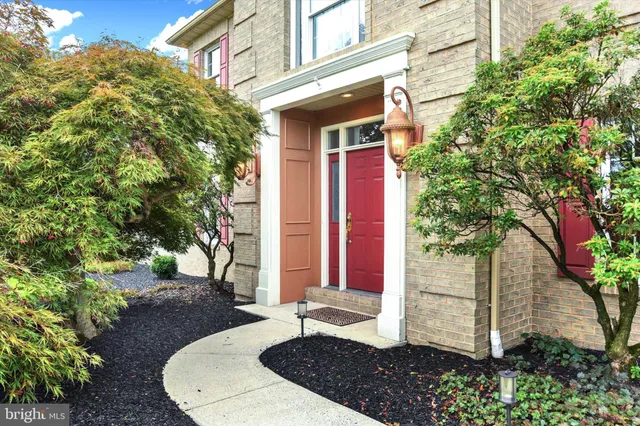 a house with trees in front of it