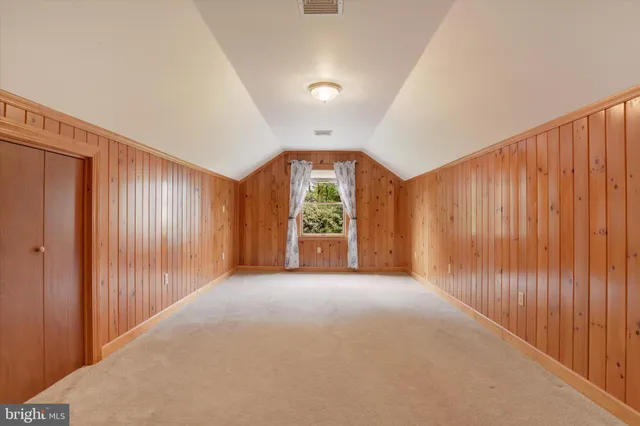 a view of a hallway with an entryway